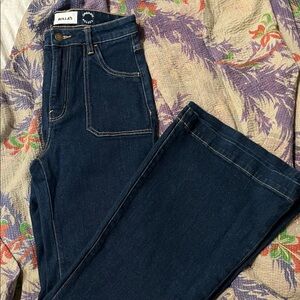 Rolla's Dark Blue FLARE wide Leg Jeans. Very fitted on top with perfect flare.